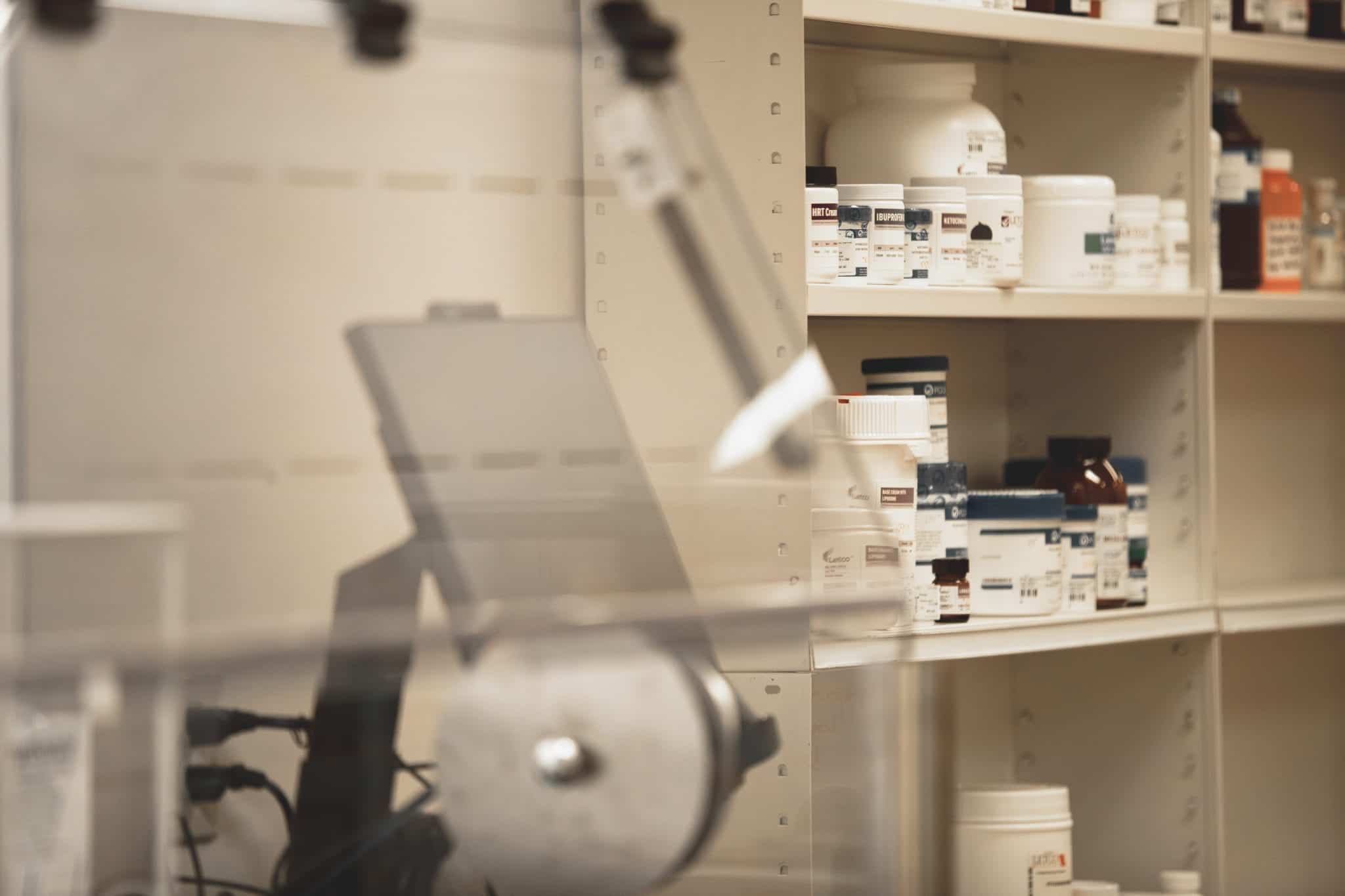 Mac’s Homepage bottles of medication on shelf at macs pharmacy