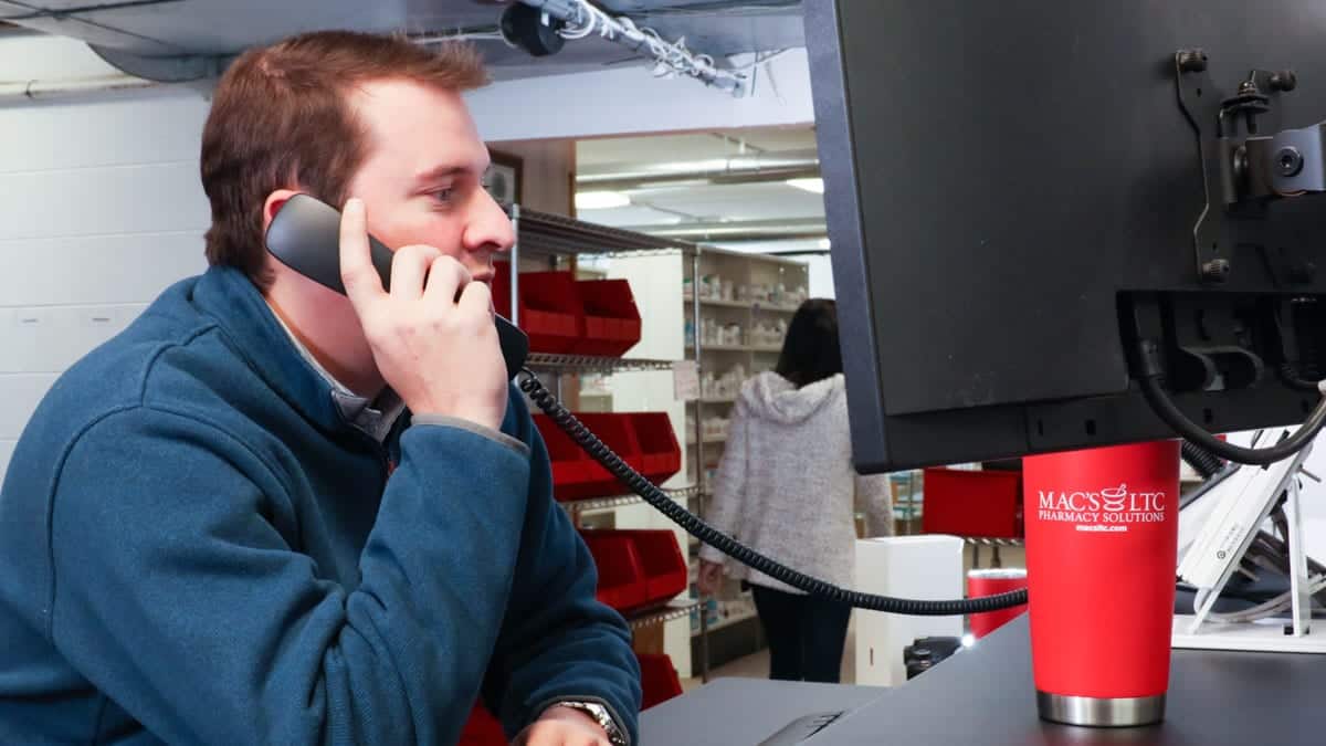 Man answers phone at Mac's LTC