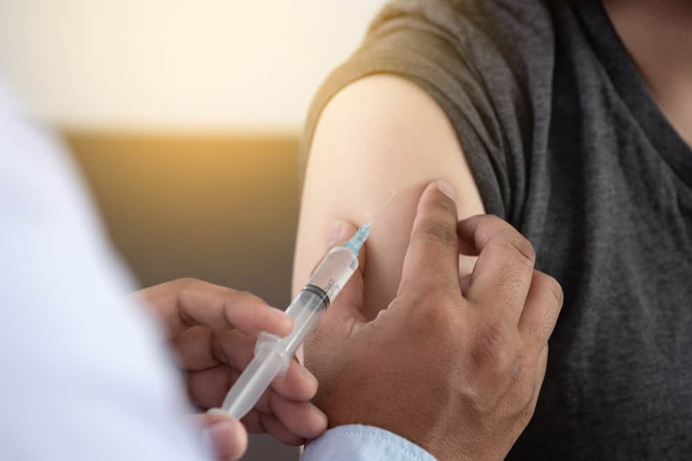 woman getting her flu shot