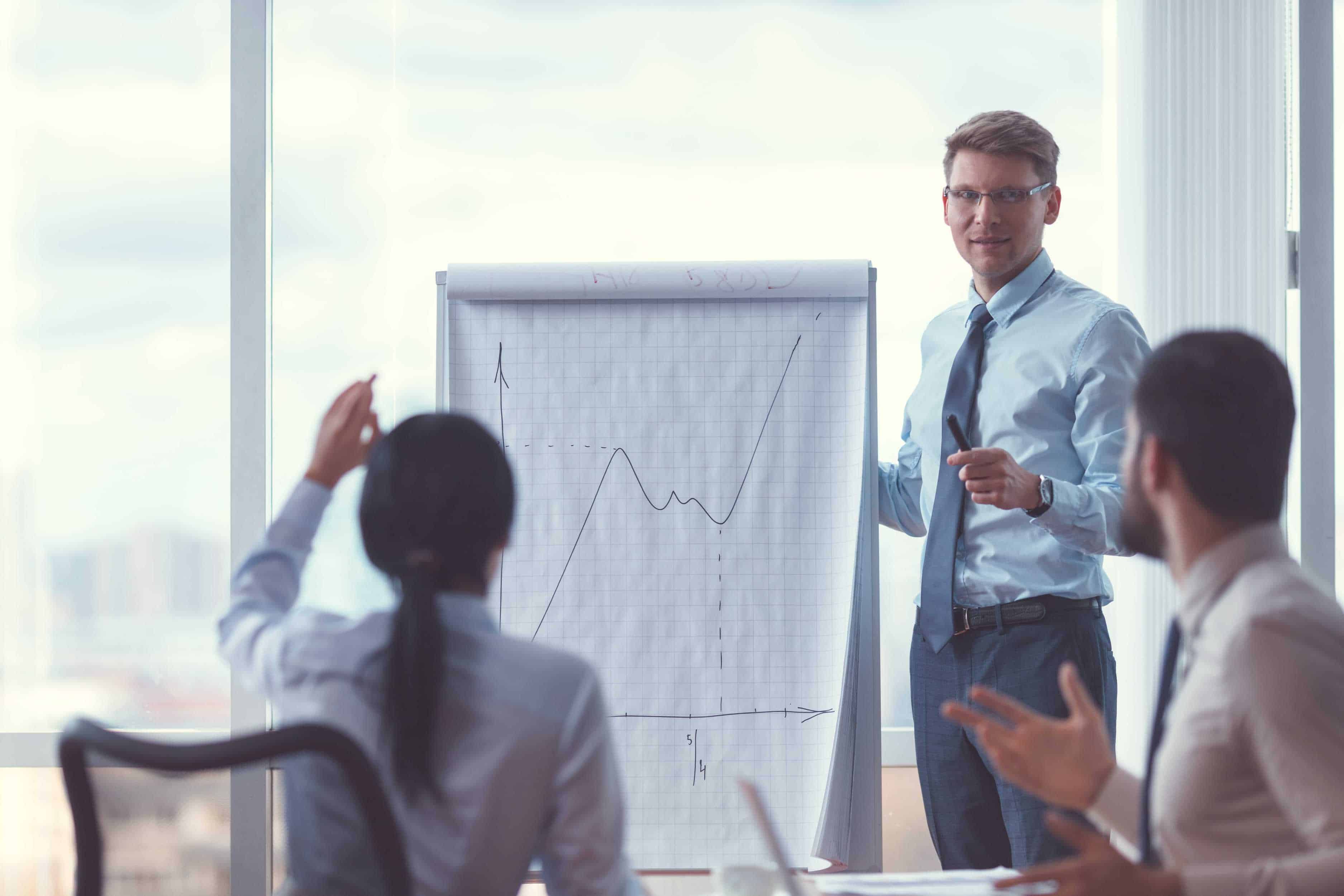 Young business people at a presentation in office