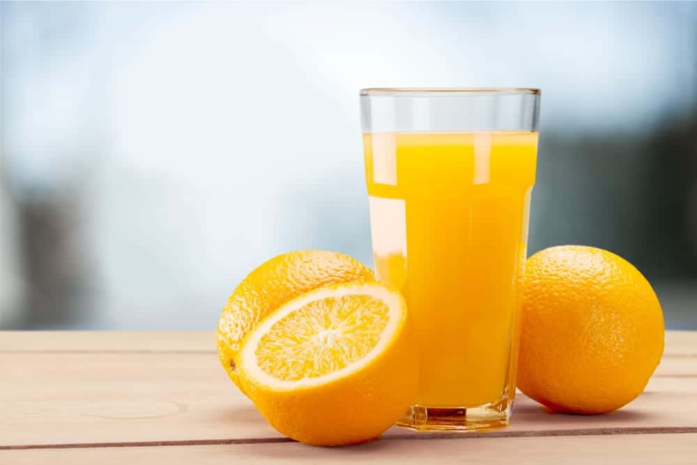 oranges and orange juice with vitamin c