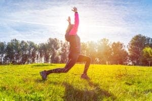 woman stretching outside