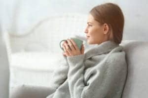 Woman drinking tea to relax