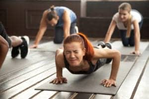 woman doing yoga in pain